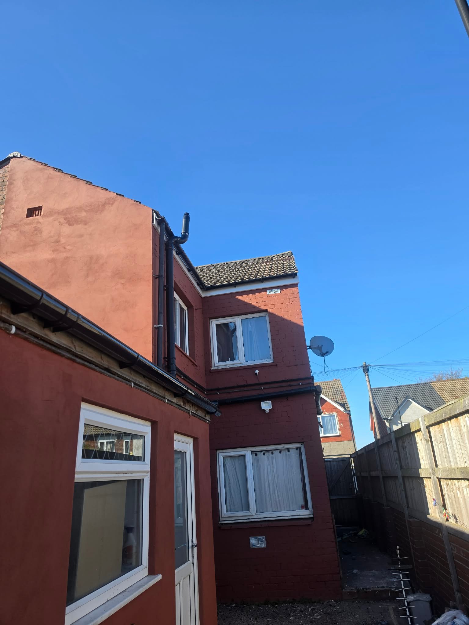 Rear extension roofline fascia and gutter repair on residential property